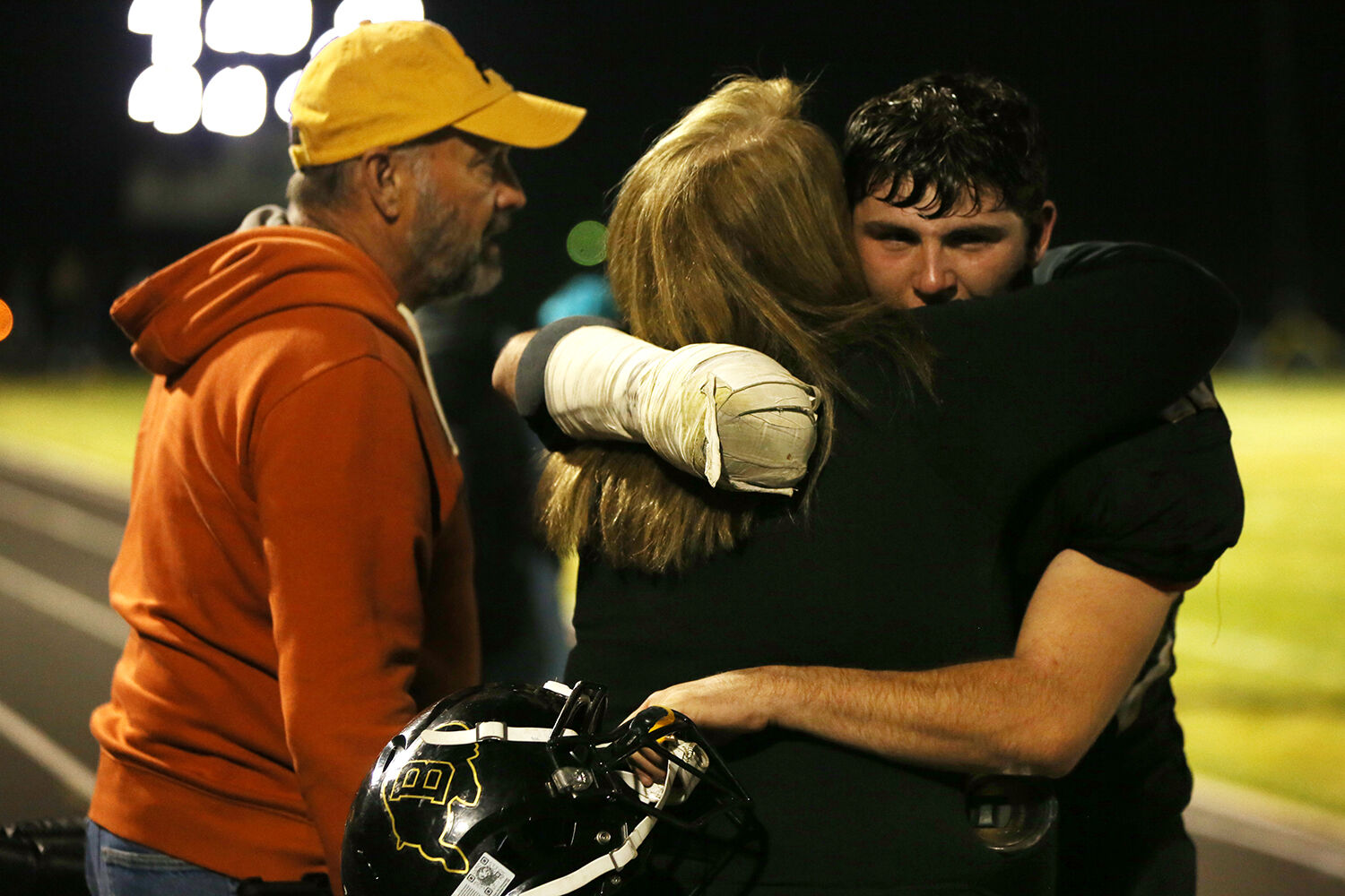 Buffalo High School lineman Keegan Money hugs his mom Rhonda